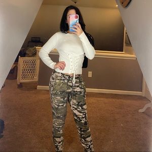 Long sleeve tee with corset style lace up front